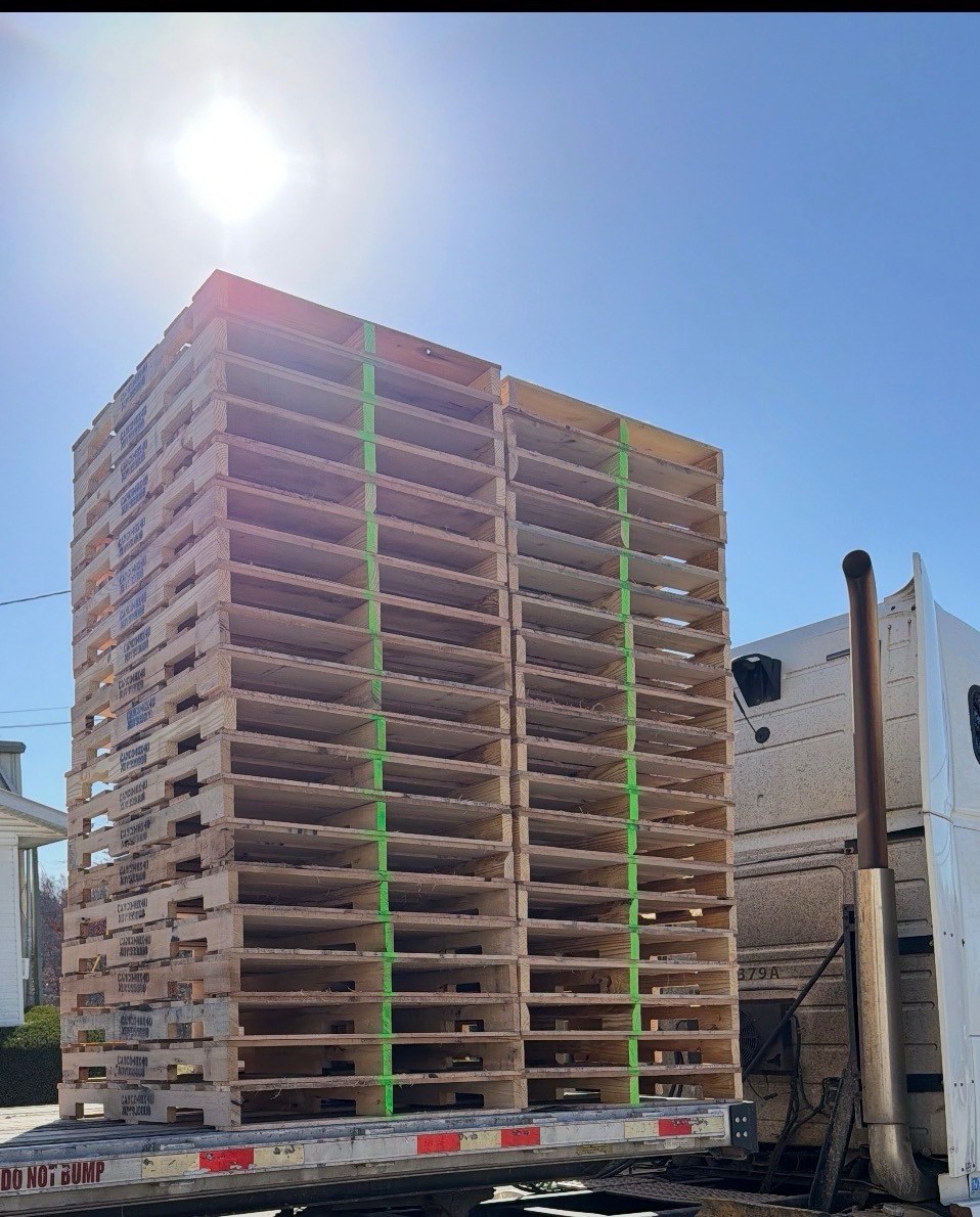 Skidmark Services truck loaded with custom pallets